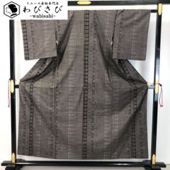本場大島紬 茶泥染 カタス7マルキ 縦柄幾何学模様 ガード加工 K-4696