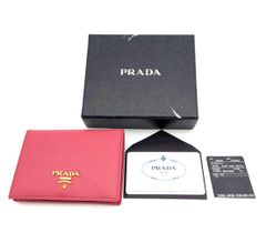PRADA】プラダ 折り畳み財布 ピンク美品【正規品証明書付き】 - メルカリ