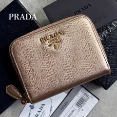 PRADA ヴェッテロムーブラウンドファスナー 長財布 ベージュ プラダPRADAヴェッテロムーブ ラウンドファスナーベージュ系