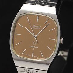세이코 샤리오 엠블럼 QZ 브라운 실버 문자판 4120-5000 남성 시계 KMR 2000000 NSK