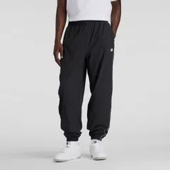 ニューバランス トレーニングパンツ メンズ Newbalance ウーブン トラックジョガーパンツ 裏トリコット起毛 スポーツウェア  裏起毛 ウーブンパンツ ロングパンツ  あたたかい 長ズボン 黒パンツ  /AMP53173-BK