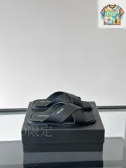 PRADA ブラック レディース オープントゥ フラット スリッパ ブラック ナッパレザー クリスクロス フラットフォームサンダル