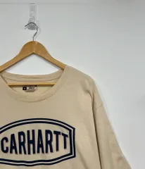 Carhartt(カーハート) ルーズフィット つづり ロゴ ラウンドネック ベージュ 半袖 Tシャツ
