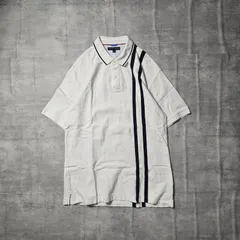 『 TOMMY HILFIGER / トミーヒルフィガー 』 半袖 ラインポロシャツ ( XXLサイズ ) ホワイト色 フロントとバックに施された縦のラインが特徴 長めの着丈が、独特なシルエットを生み出し、スタイリッシュな雰囲気を演出