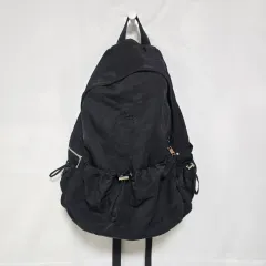 STAND OILブラックナイロンリュック・バックパック Tied Backpack / Black - Stand Oil