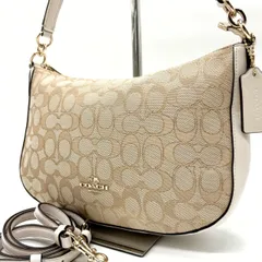 ✨良品✨ COACH コーチ 2way ショルダーバッグ トートバッグ シグネチャー  馬車金具 総柄 ロゴ型押し チャーム キャンバス レザー レディース ベージュ 肌色 ホワイト 白色