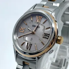 【稼働品／美品】セイコー ルキア 人気モデル 腕時計 1B22-0AS0 電波ソーラー レディース デイト ピンクゴールド コンビカラー ローマ数字 上品 エレガント ビジネス オフィス 高機能 洗練デザイン 手元華やか クリーニング済 G5