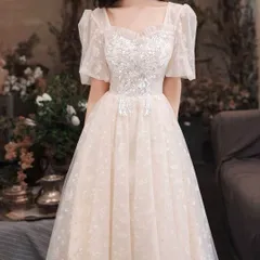 スパンコールにビジューが美しいパフスリーブイブニングドレス