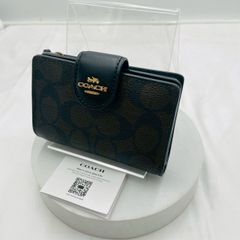 【❗️✨美品✨❗️】COACH コーチ 折りたたみ財布 シグネチャー柄 ブラック×ブラウン ロゴ金具付き F11484