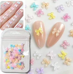 K-Bom ネイルパーツ リボン 小さめ ミニ 3D 立体 7色 100個セット ネイルアート ワンホンネイル レジン デコパーツ ジェルネイル DIYネイル 蝶々風デザイン アクセサリーパーツ(マルチカラー,  6x6x1mm)