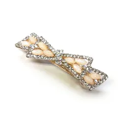 ライトピンクのビーズ石付キャストリボンバレッタ