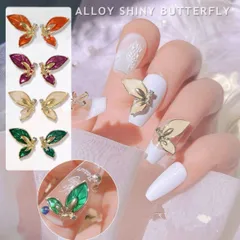 【美品】ネイルパーツ 蝶 4個入 ホワイト 右向き H444