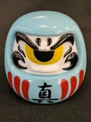 REALHEAD フォーチュンだるま (水色成型/白顔/赤線/黄黒目