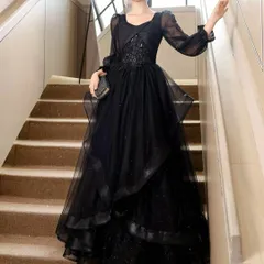 リボンにお花のデザインが可愛い フリルスカートの長袖ドレス