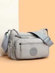 バッグ レディース ショルダーバッグ 調整可能な肩紐付きナイロンショルダーバッグ、複数の収納部、無地、ジッパー開閉、ポリエステルライニング、軽量で汎用性のあるクロスボディバッグ、日常使い