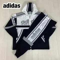 adidas トラックスーツ セットアップ ジャージ上下 L ブラック× ホワイト ビッグロゴ ジャケット着丈74cm 肩幅58cm 身幅(脇下)65cm 袖丈53cm パンツ総丈94.5cm ウエスト72cm 股上28.5cm 股下69cm【古着】