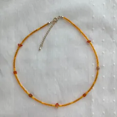 オレンジカラーのビーズネックレス・チョーカー