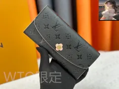 LVルイ?ヴィトン/財布は柔らかい革で作られている。ファスナーヘッドとボタンが趣味で花に化ける。カバーを開くと、実用的で洗練されたデザ