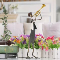 フルートを吹く人物のブロンズ像 置物 - メルカリ