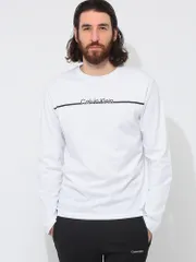 Calvin Klein (カルバンクライン) ラインロゴ クルーネック 長袖 Tシャツ CKK10K114343 ホワイト