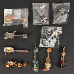 ハードロックカフェピンバッチ 121個 ガラスケース入り