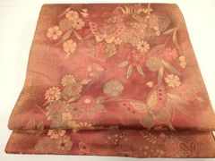 美品 赤茶系の唐織袋帯 四季草花 松竹梅 菊 吉祥文様 セミフォーマル