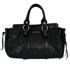 【極美品】miumiu　ハンドバッグ ミュウミュウの「詰め込み過ぎ」バッグに美を見出す── 多忙な