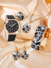 Women's Watch Set: 1-piece women's watch with multicolored rhinestone and crushed stone inlays and an exaggerated design. Includes a fashionable metal necklace kit, earrings, bracelet, and ring jewelry set.