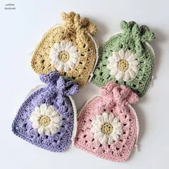 【ハンドメイド・手編み】花咲くコットン巾着・巾着・ポーチ・小物入れ・AirPodsケース・イヤフォンケース・クロシェ編み・ミニギフト・プチプレゼント