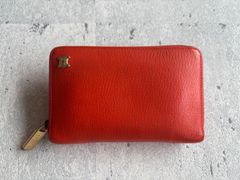 CELINE トリオンフポイント ジップウォレット オレンジ×ピンク