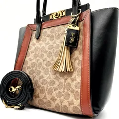 未使用保管品<!-利用不可文字-!>COACH コーチ 2WAY ハンドバッグ ショルダーバッグ シグネチャー ターンロック バイカラー 馬車 フリンジ 斜め掛け 78487 シグネチャー PVC レザー 革 ブラウン ブラック 通勤 通学 レディース 女性