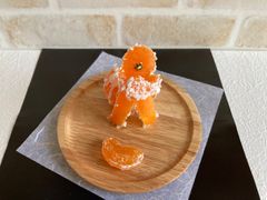食品サンプル☆みかんのオブジェ☆ペンを抱えるみかん