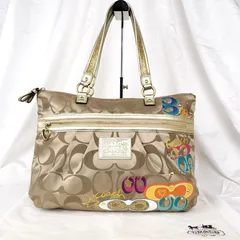 【遊び心と上品さの融合✨】 COACH コーチ トートバッグ Poppyシリーズ シグネチャー キャンバス 大容量 華やかデザイン　ベージュ