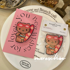 日焼けキティ グリップトック ❤︎ hellokitty ハローキティ ガングロ 波乗りキティ 平成ギャル 黒ギャル サーフィン サーフ SURF Hawaii ハワイ フラダンス アロハ ALOHA スマホグリップ バンカーリング スマホリング 韓国限定