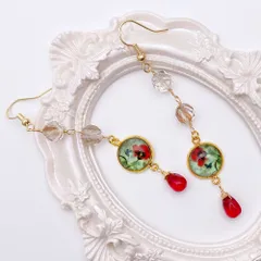 ブロンズシャインクリスタルと赤い小花のカボションピアス