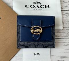 【新品未使用】COACH  コーチ二つ折り財布 馬モチーフブルーシグネチャー