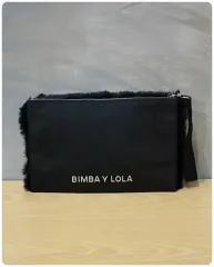 ビンバイローラ ファー バイカラー クラッチバッグ