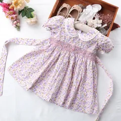 新品 スモッキングワンピース　パープル系　子供用品　花柄ワンピース　リボン　ハンドメイド　上品　丸襟　発表会　リングガール　半袖　可愛い　コットン100％ 　双子服　 誕生日　　撮影　七五三祝い　お姫様　90,95,100,110cm,120cm,130cm