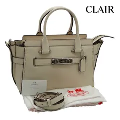 コーチ ショルダーバッグ 2WAYハンドバッグ シグネチャー ターンロック 白 ホワイト レディース COACH