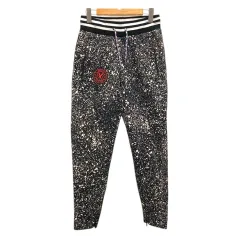 プーマ PUMA ×Daily Paper スウェットパンツ ボトムス ワンポイントロゴ 総柄 S 黒 ブラック 白 ホワイトのサムネイル