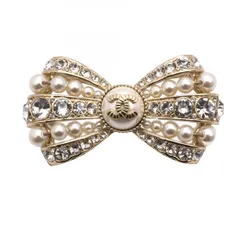 ★SALE【5jdb0215】シャネル ブローチ ココマーク リボンモチーフ GPメッキ フェイクパール ラインストーン シャンパンゴールド【中古】レディース