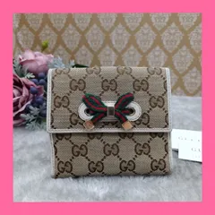 《 GUCCI 》　★希少★　グッチ　折財布　プリンシー　コンパクトウォレット　2つ折財布　ダブルホック　GGキャンバス　リボン　シェリーライン　生産停止商品　ベージュ系　送料無料・匿名配送・最短即日発送いたします！　446