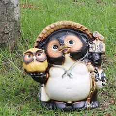 信楽焼 たぬき 送料無料 タヌキ 陶器タヌキ たぬき置物 やきもの しがらきやき 狸 タヌキ 信楽 焼き物たぬき 陶器たぬき 狸しがらき 9号黄ふくろう持ち狸 ta-0297