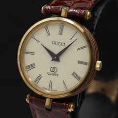 GUCCI 7200M ローマ数字 ラウンド 腕時計 - メルカリ
