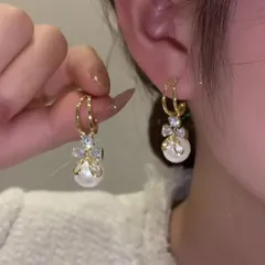 ピアス 韓国 揺れる パールリボンピアス