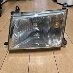 100系　ランクル　純正　ヘッドライト  L