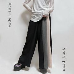 サイドにタック アシメなワイドパンツ