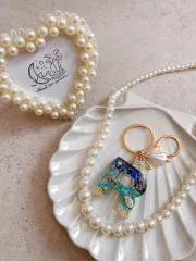 まるで海 イニシャルキーホルダー 名入れ オーダーメイド カップル 敬老の日 結婚 出産祝い 誕生日 デート 世界に一つだけのキーホルダー