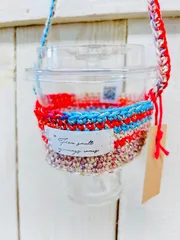 コットン糸で編んだドリンクホルダー　暖色系と金糸