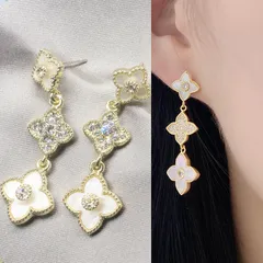 ピアス　揺れる　キラキラ　クローバー　K18YG×白